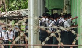 Students waiting outside classrooms in Sitwe, western Rakhine State
