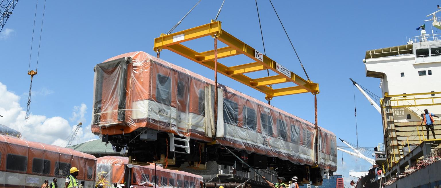 A carriage for the Tanzania's Standard Gauge Railway is unloaded