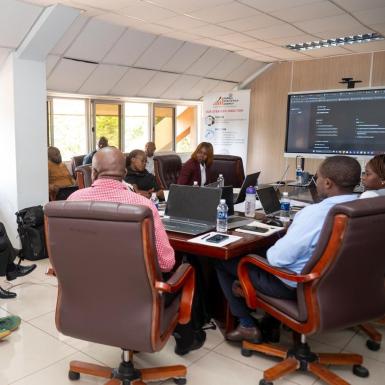 Photo of Zambia Evidence Lab launching LFS automation to classify job data. (IGC photo)