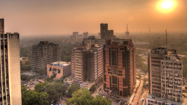 Delhi skyline with green cover in background. 