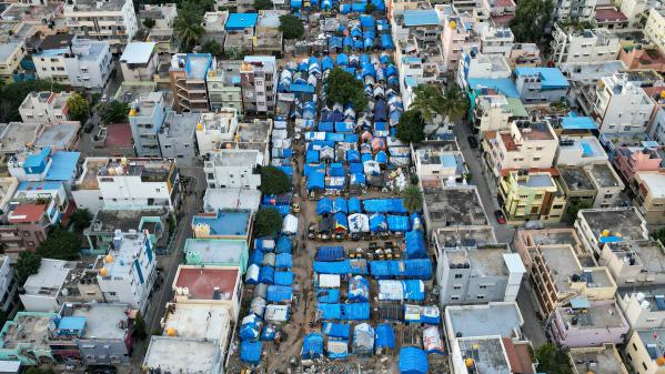 An aerial view of an informal settlement amidst an urban residential area in Bengaluru, India