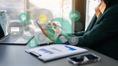 Close up of businesswoman or accountant hand typing laptop working to calculate on desk about cost at office.