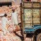 Workers Loading Pink Himalayan Salt into Truck, Khewra Salt Mine, Pakistan. Photo by Adam Cohn via Flickr