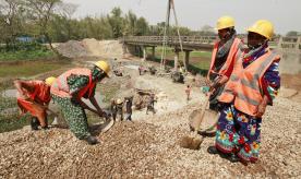 Women bricklayers repair bridge in Bangladesh