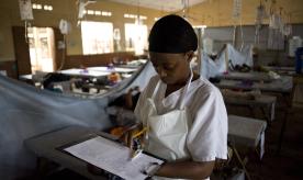 A nurse checks medical documents at the Wellington Cholera Treatment Unit (CTU), in Freetown on August 29, 2012