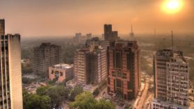 Sun setting at Connaught Place in Delhi. Photo credit: Ville Miettinen, CC BY 2.0.