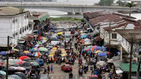 Waterside Market, looking north down Randall Street. In Monrovia, Liberia. Photo credit: Travis Lupick / Moment via Getty Images.