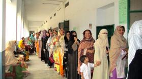 Women in Pakistan wait to vote