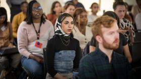 the audience listening to a speaker. Photo by Stephen Swain
