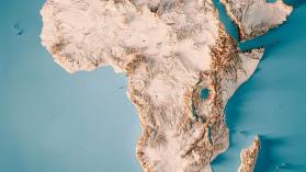 Critical minerals are widely found in Africa with the image depicting a 3D Render of a Topographic Map of Africa, surrounded by a blue background.