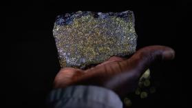 A Person Holding A Piece Of Copper Ore - stock photo 	by Bloomberg Creative Collection:	Bloomberg Creative Photos/ Getty Images