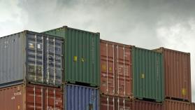 Africa, Tanzania, Dar Es Salaam, View Of Stacked Steel Shipping Containers (Year 2009). Photo credit: Kypros / Timing via Getty Images.