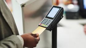 Credit card, payment and customer hands at pos register terminal for product purchase, retail service or supermarket commerce. Photo credit: Adene Sanchez / E+ via Getty Images.