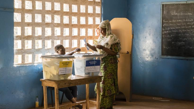 Woman voting in Sierra Leone