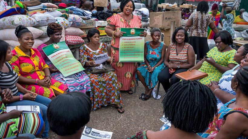 Female entrepreneurs in Ghana sitting around in a circle for networking