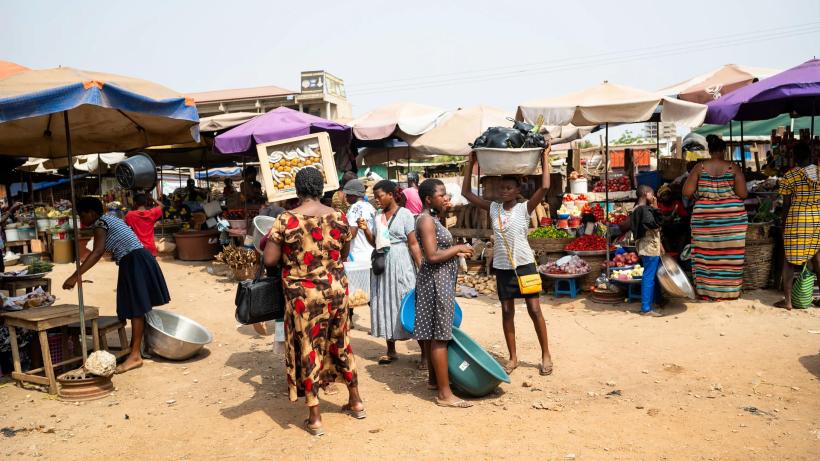 Transformational change taking place in agricultural markets as market stall holders interact in Accra, Ghana
