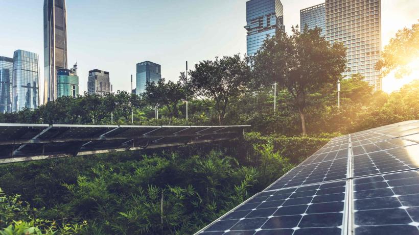 Roof top solar installation with shenzhen downtown skyline view as background,China.