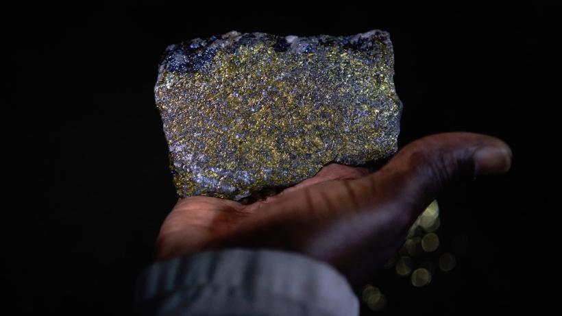 A Person Holding A Piece Of Copper Ore - stock photo 	by Bloomberg Creative Collection:	Bloomberg Creative Photos/ Getty Images