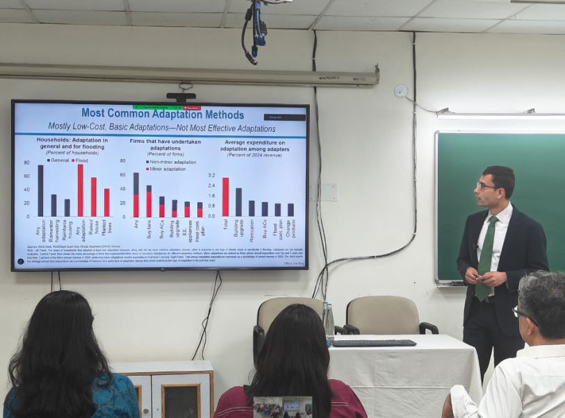 A photo of a presentation being delivered to an audience in attendance at a conference in India.