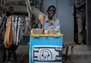 A money exchanger counts Somali shilling notes on the streets of the Somali capital Mogadishu.