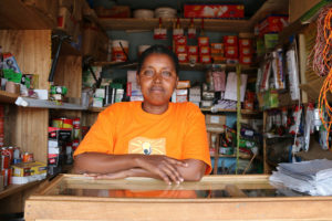 1ustina Balankena is a Solar Sister Entrepreneur and small business owner in Bomani, Tanzania where she sells lightbulbs, electrical tape, paintbrushes, and, now, small, single unit solar lights and energy efficient cookstoves. Photo: USAID